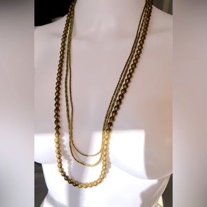 ANTIK BATIK three strand brass colored bead necklace